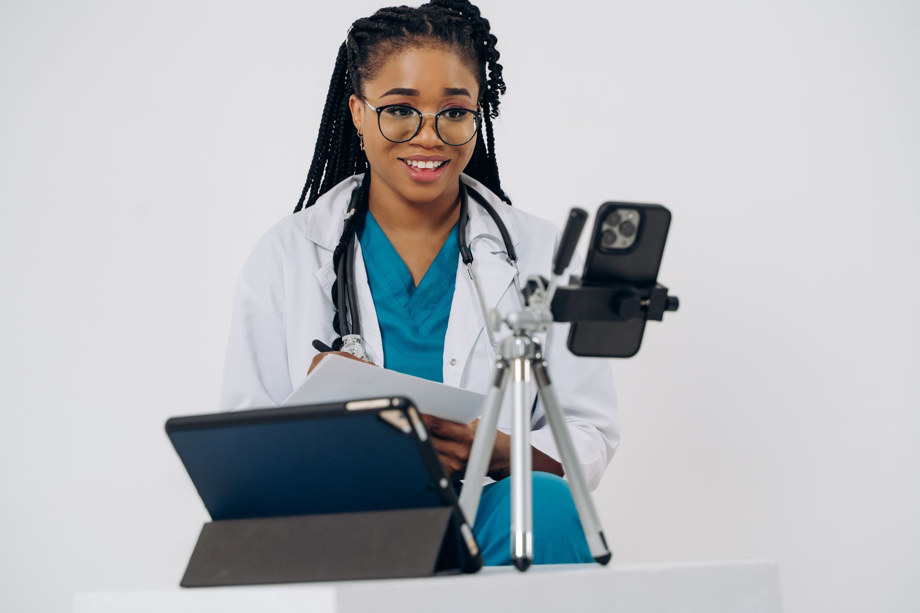 Optium clinician providing a secure telehealth consultation